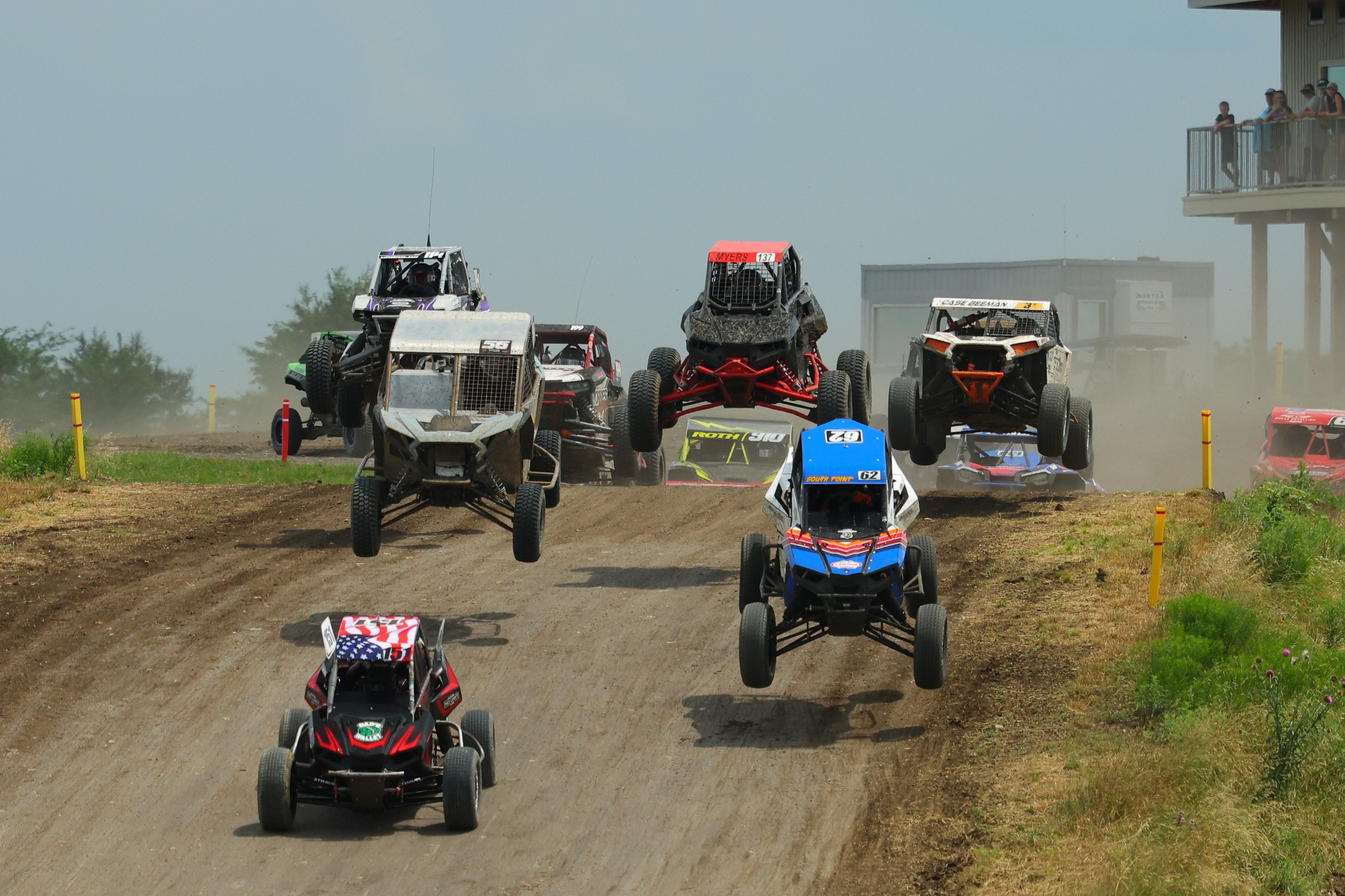 Outlaw Series SXS racers competing in short course racing